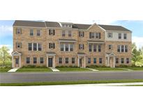 Three-story townhome community with brick facade and landscaping at 233 Lytham Se Dr, Mableton, GA 30126