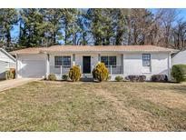 Charming ranch home with updated exterior and landscaping at 3766 Stanford Cir, Decatur, GA 30034