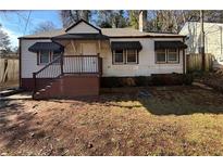 Ranch style home with front yard and steps leading to the entrance at 2669 Blount St, Atlanta, GA 30344