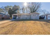 Newly renovated ranch home with a spacious front yard at 2833 Lynda Pl, Decatur, GA 30032