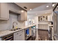 Modern kitchen with granite countertops and stainless steel appliances at 3648 Peachtree Ne Rd # 3J, Atlanta, GA 30319