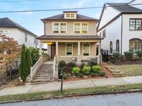 Two-story craftsman home with front porch and brick walkway at 627 Mead Se St, Atlanta, GA 30312