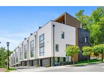 Modern townhouses with attached garages and landscaped yards at 622 Bellemeade Nw Ave # 9, Atlanta, GA 30318