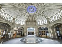 Grand lobby with high ceilings and ornate details at 57 Forsyth St # 13D, Atlanta, GA 30303