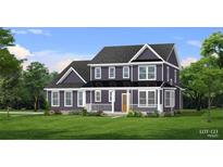 Two-story house with gray siding, white trim, and a grassy lawn at 4032 Andover Cir, Mcdonough, GA 30252
