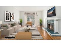 Bright living room with fireplace and hardwood floors at 1668 Terrell Ridge Dr, Marietta, GA 30067