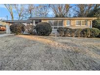 Ranch style home with mature landscaping and a spacious yard at 2372 Tyler Way, Decatur, GA 30032