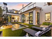 Inviting backyard with pool, spa, and lounge area; perfect for relaxation at 211 N Esplanade, Alpharetta, GA 30009
