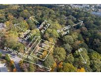 An aerial view of a property with lot outlines and surrounding landmarks like Lenox Mall and Buford Highway at 1141 Goodwin Ne Pl, Brookhaven, GA 30319