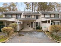 Attractive townhome with covered parking and private fenced yard at 4882 Twin Lakes Trl, Atlanta, GA 30360