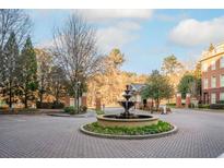 Attractive community entrance with fountain and gated access at 200 River Vista Dr # 424, Atlanta, GA 30339