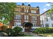 Brick building exterior with classic architecture and landscaping at 229 Ponce De Leon Ne Ave # 10, Atlanta, GA 30308