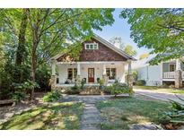 Craftsman home with stone porch and landscaped yard at 1060 Shelby Pl, Atlanta, GA 30316