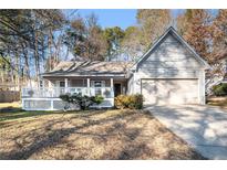 Charming ranch home with a large deck and attached garage at 1276 Westover Nw Trce, Acworth, GA 30102