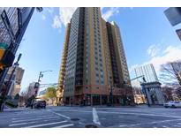 Peachtree Towers building exterior, featuring modern architecture and city views at 300 W Peachtree Ne St # 8E, Atlanta, GA 30308