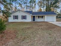 Newly renovated single-story home with a spacious yard at 890 Navajo Trl, Covington, GA 30016