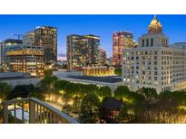 Stunning cityscape view at night from a private balcony at 943 Peachtree Ne St # 1109, Atlanta, GA 30309