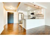 Modern kitchen featuring stainless steel appliances and granite countertops at 620 Peachtree Ne St # 415, Atlanta, GA 30308