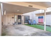 Covered parking with private entrance and small turf yard at 4846 Twin Lakes Trl, Atlanta, GA 30360