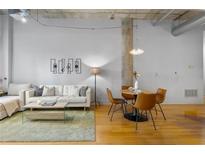 Bright and airy living room featuring an open floor plan and modern decor at 1058 Piedmont Ne Ave # 302, Atlanta, GA 30309