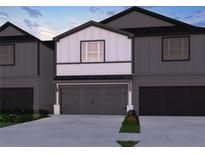 Charming two-story home with a spacious two-car garage and attractive exterior at 2115 Avalon Rdg, Conyers, GA 30013