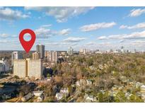 Stunning aerial view of the city skyline and surrounding neighborhood, perfect for real estate at 2479 Peachtree Ne Rd # 202, Atlanta, GA 30305