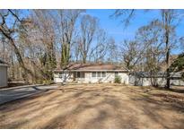 Ranch house with a large front yard and driveway at 195 Polar Rock Sw Rd, Atlanta, GA 30315