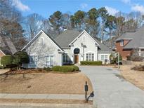 Two-story house with gray roof, driveway, and basketball goal at 2870 The Terraces Way, Dacula, GA 30019