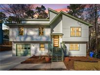 Charming two-story home with updated siding and landscaping at 1505 Jamerson Lndg, Marietta, GA 30066