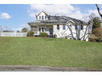 All-brick home with a spacious front yard and attached two-car garage at 4485 Coventry Ne Way, Roswell, GA 30075