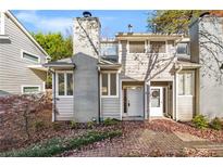 Inviting exterior of charming townhome with brick walkway at 855 Greenwood Ne Ave # E, Atlanta, GA 30306