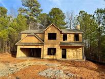 Two-story house under construction, featuring a large front yard at 16 Deer Place, Villa Rica, GA 30180