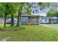 Charming renovated home with a welcoming front porch and new landscaping at 639 Ozburn, Atlanta, GA 30318
