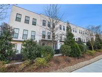 Modern white brick townhouses with landscaping at 860 Constellation Dr, Decatur, GA 30033