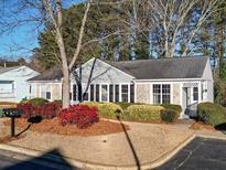 Ranch style home with stone accents and mature landscaping at 373 Oak Harbor Trl, Marietta, GA 30066