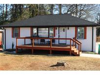 Charming ranch home features a newly renovated exterior with a deck at 2185 Fairfield St, Smyrna, GA 30080