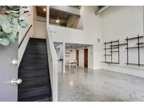 Modern entryway with metal staircase leading to upper loft at 195 Arizona Ne Ave # 158, Atlanta, GA 30307