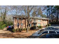 Brick building with ample parking and landscaping at 510 Coventry Rd # 19A, Decatur, GA 30030