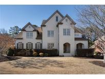 Beautiful two-story home with a well-manicured lawn and neutral colored painted brick exterior at 183 Applewood Ln, Acworth, GA 30101