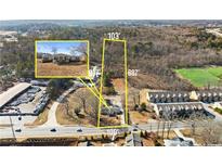 Aerial view showing house, lot, and surrounding area at 207 Arcado Nw Rd, Lilburn, GA 30047