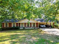 Brick ranch home with carport and large yard at 284 Sw Peyton Rd, Atlanta, GA 30311