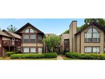 Attractive exterior of a two-story building with a walkway and landscaping at 713 Cypress Pointe St, Alpharetta, GA 30022