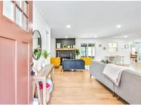 Inviting entryway with a red door and view of the living room at 6828 Lockridge Dr, Atlanta, GA 30360