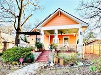 Charming craftsman home with a inviting front porch and well-maintained landscaping at 1736 Thompson Ave, Atlanta, GA 30344