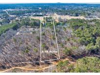 8.48 acre lot with pond, located near Hwy 78 at 3228 Rosebud Rd, Loganville, GA 30052