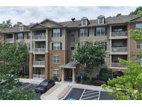 Brick building with balconies and parking at 1910 Cedar Glenn # 4310, Atlanta, GA 30339