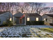 Charming gray bungalow with a covered porch, and manicured lawn, freshly painted at 1327 Hosea L Williams Se Dr, Atlanta, GA 30317