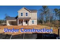 Two-story house under construction with a neutral exterior and attached garage at 368 Forkview Dr, Lawrenceville, GA 30044