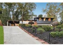 Updated ranch home with a landscaped yard and driveway at 2139 Cedarbrook Se Ct, Atlanta, GA 30316