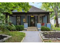 Charming blue bungalow with a welcoming front porch at 120 Howard Se St, Atlanta, GA 30317